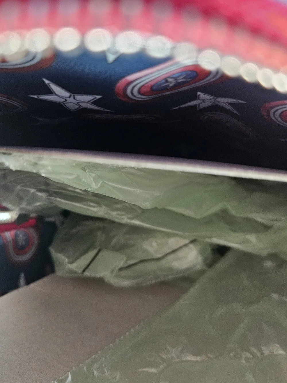 This is a Loungefly Marvel Captain America: Brave New World Cosplay Mini Backpac